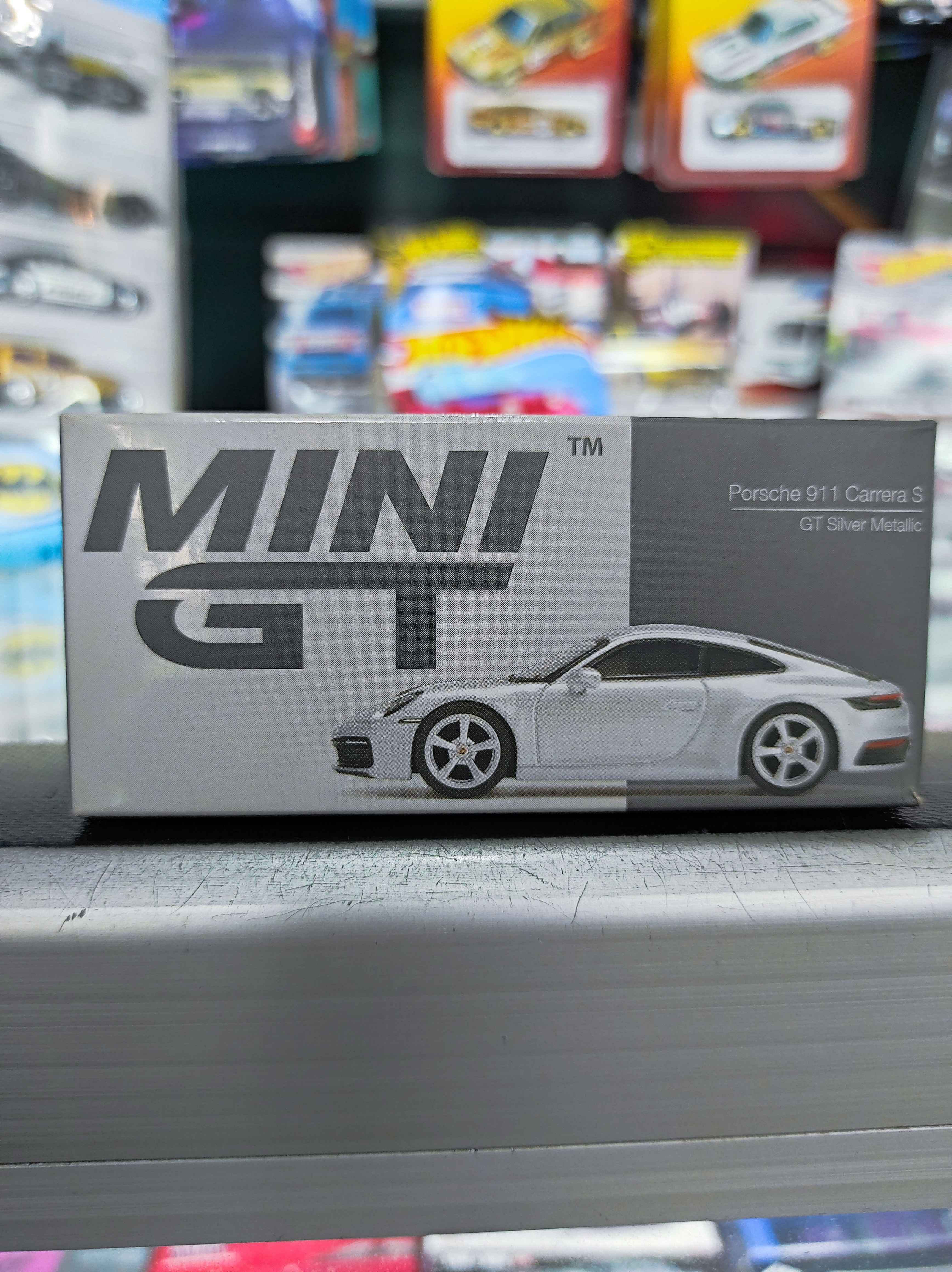 MINI GT 1:64 Porsche 911 Carrera S (GT Silver Metallic)